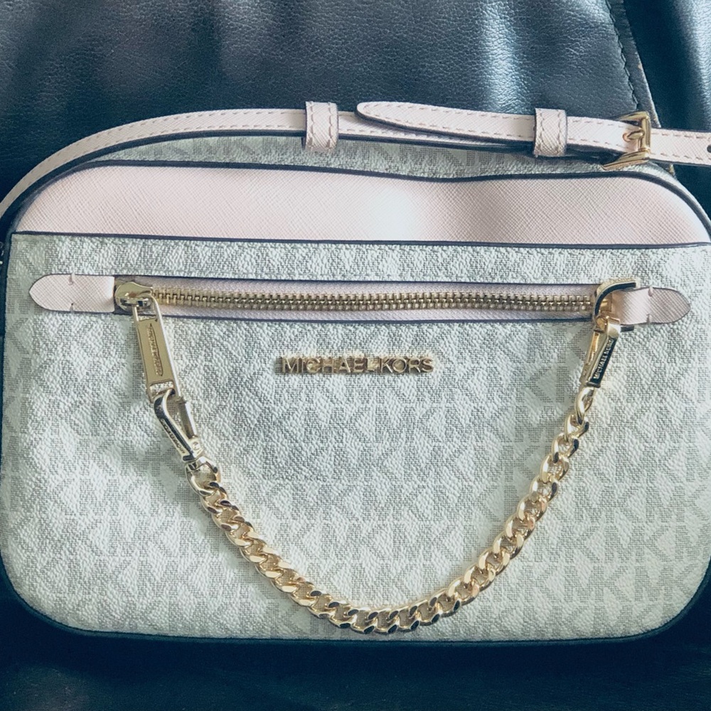 Michel kors. En buen estado color rosa